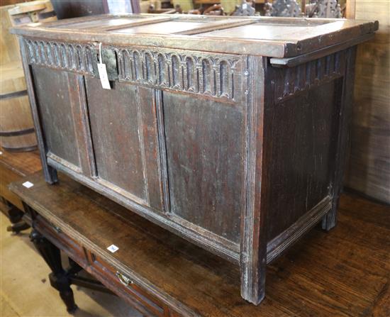 A late 17th/early 18th century oak three-panel coffer, W. 3ft 2in. D. 1ft 6in. H. 2ft.